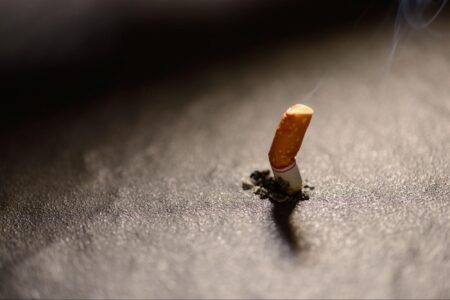 Cigarette being burnt out.